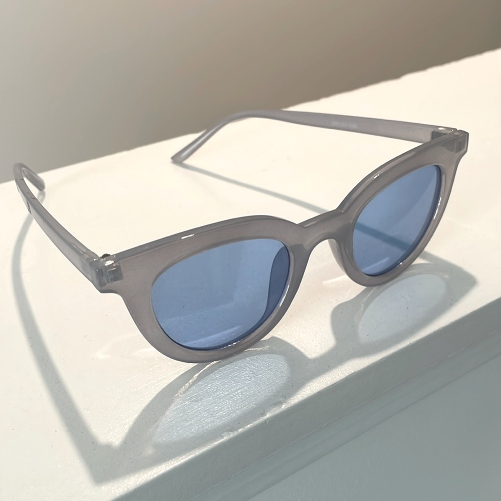 Light blue chic woman sunglasses